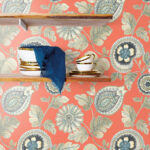 Calypso Paisley Leaf - Coral and Aloe | Oranges Florals, Botanicals and Tropicals Wallpaper for Nursery, Dining Room, and Entryway